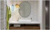 Oval mirror in the bathroom with lamps from Jeremy Pyles and Niche Modern collection