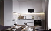  White corner kitchen with sleek facades