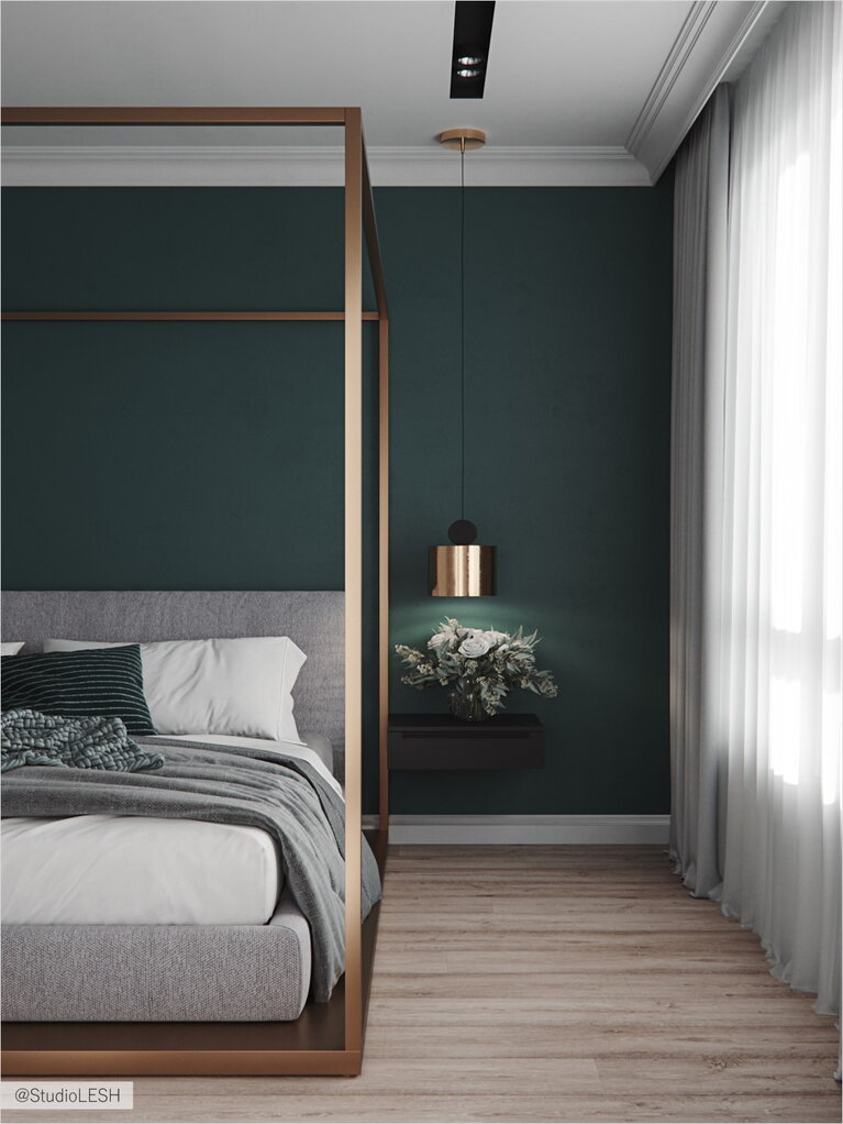 Geometry emphasized by the bed frame and hanging lamps in the bedroom