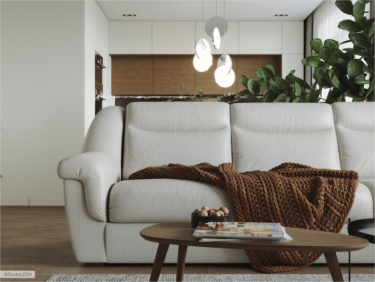 Деревянный журнальный столик в гостиной с белым диваном.