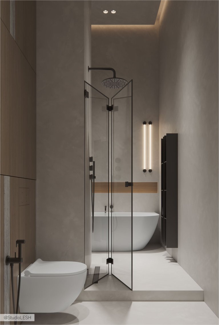 Интерьер современной ванной комнаты с душевой кабиной из стекла, отдельно стоящей ванной и минималистичной мебелью.