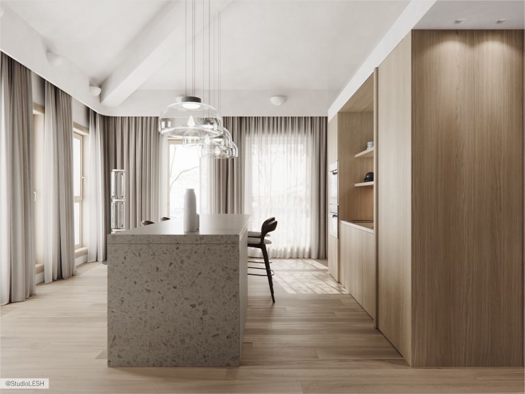 Интерьер современной кухни с серым кухонным островом, подвесными светильниками над ним, деревянными шкафами и большими окнами.