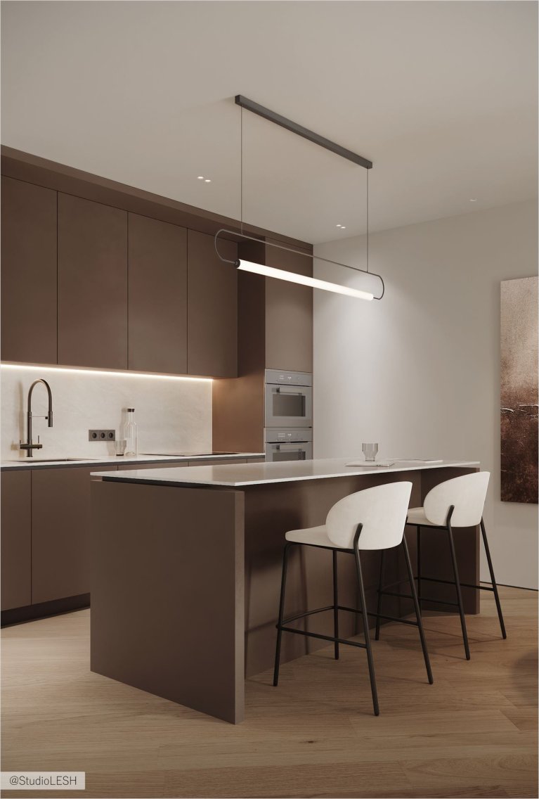 Минималистичная кухня, где каждая деталь имеет свое место. Серые фасады шкафов и белый остров создают ощущение гармонии и баланса