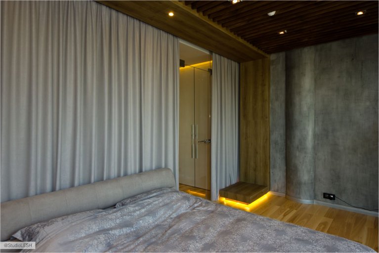 Декоративная штукатурка под бетон в интерьере спальни 