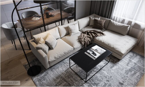 Большой мягкий диван в гостиной с дизайнерским столиком