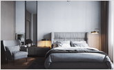 Светлая спальня в современном стиле с большой двухспальной кроватью
